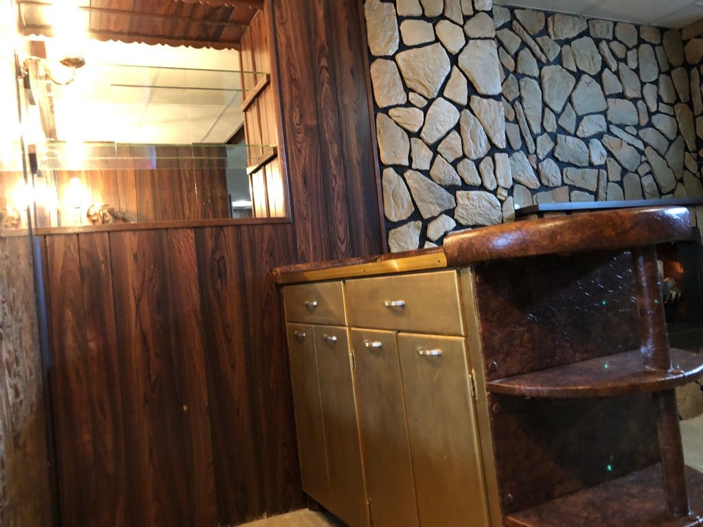 Behind the bar.