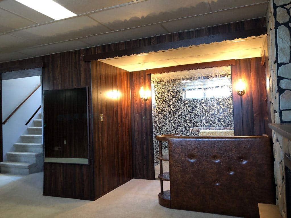Retro mirror tiles behind the bar.