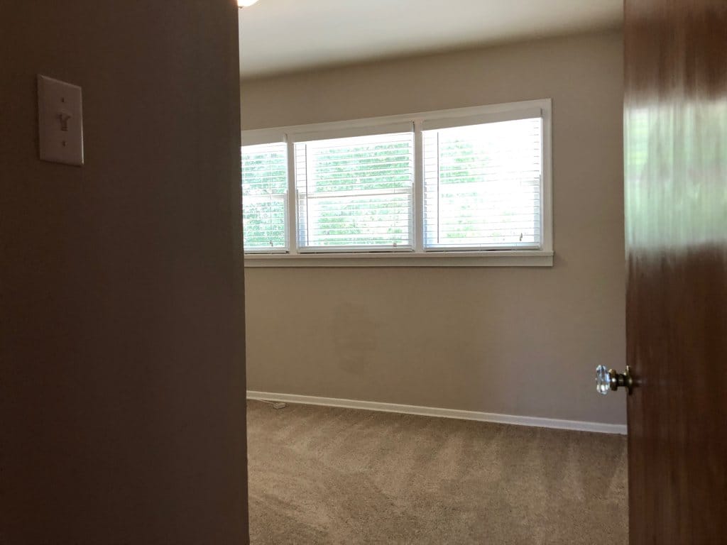 East bedroom, slightly smaller than the west bedroom.